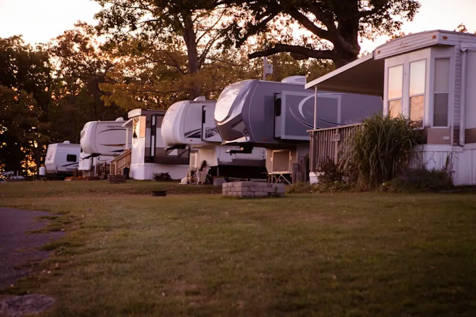 Seasonal RVs parked on the lawn at Double G in the evening light